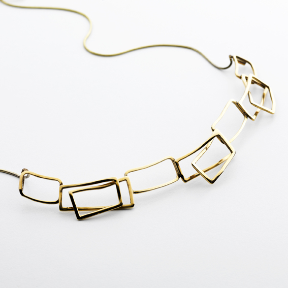 Gold component wave necklace